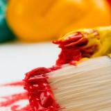 image of pain brush with paint on it